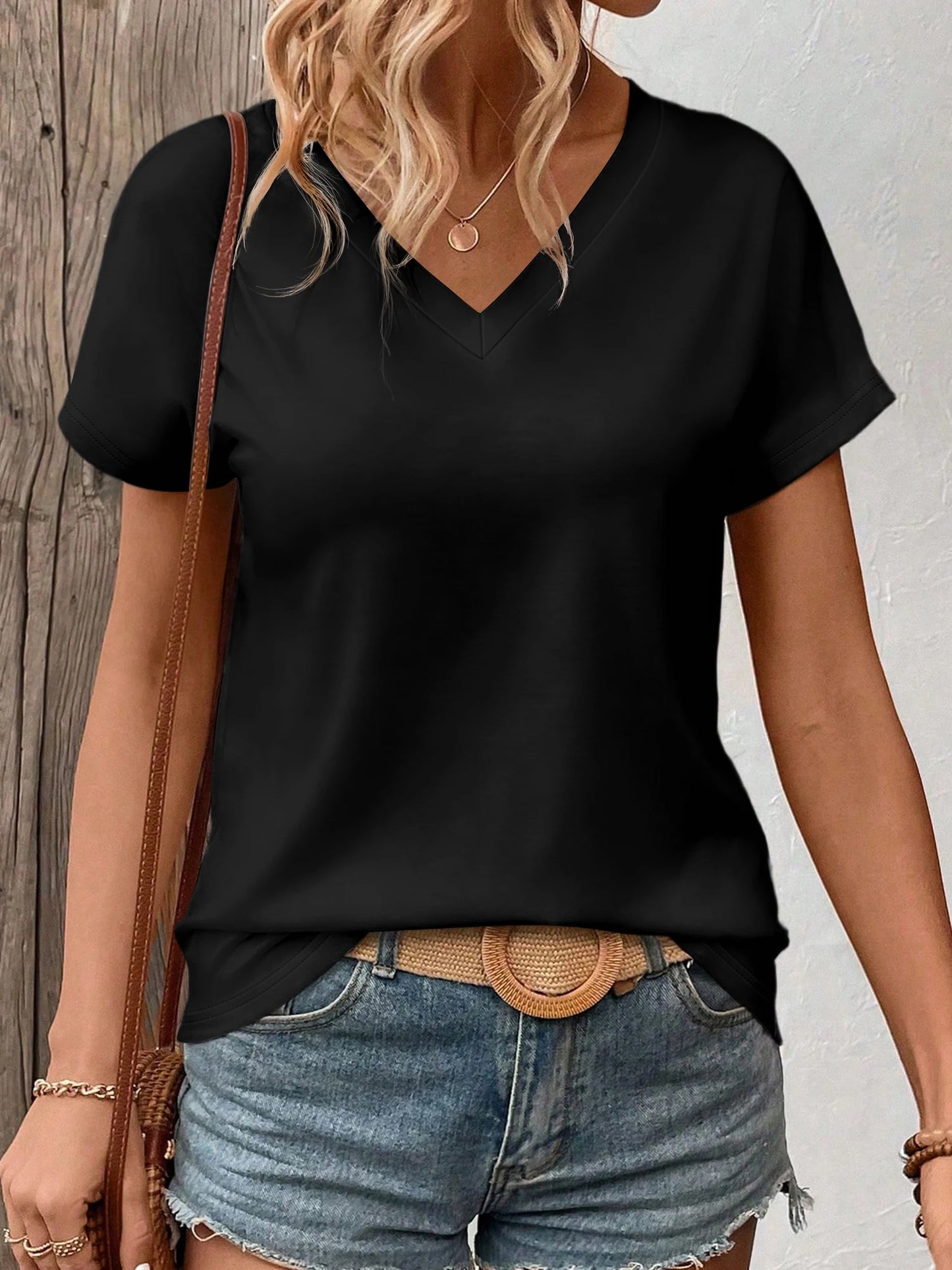 Women's Solid Color V-Neck T-Shirt - Oversized Short-Sleeve, Curved Hem, Soft Fabric, Available in Black, Gray & Navy